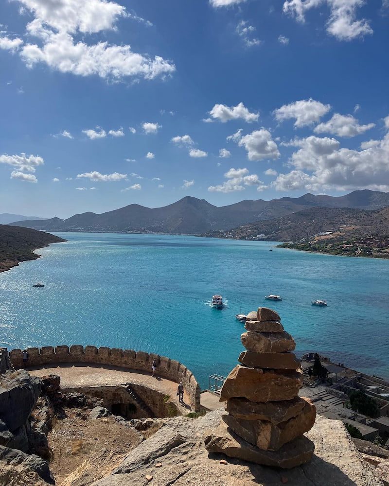 The bay and Elounda coast viewed through Spinalonga’s stone fortifications.