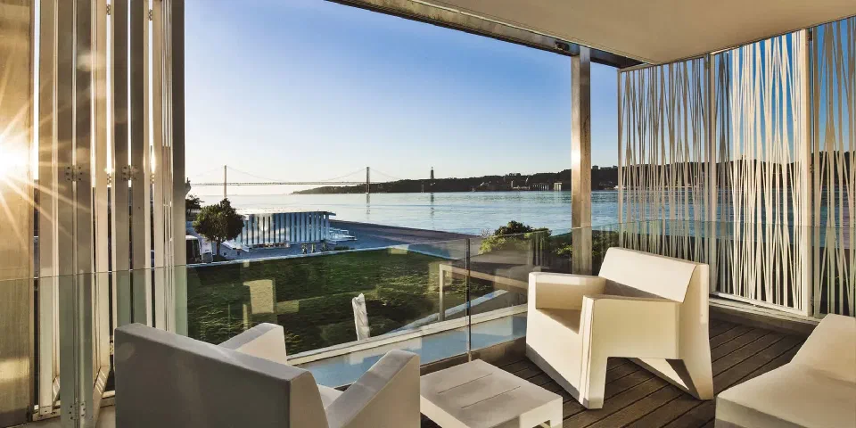 Balcony seating overlooking the Tagus at Altis Belém.