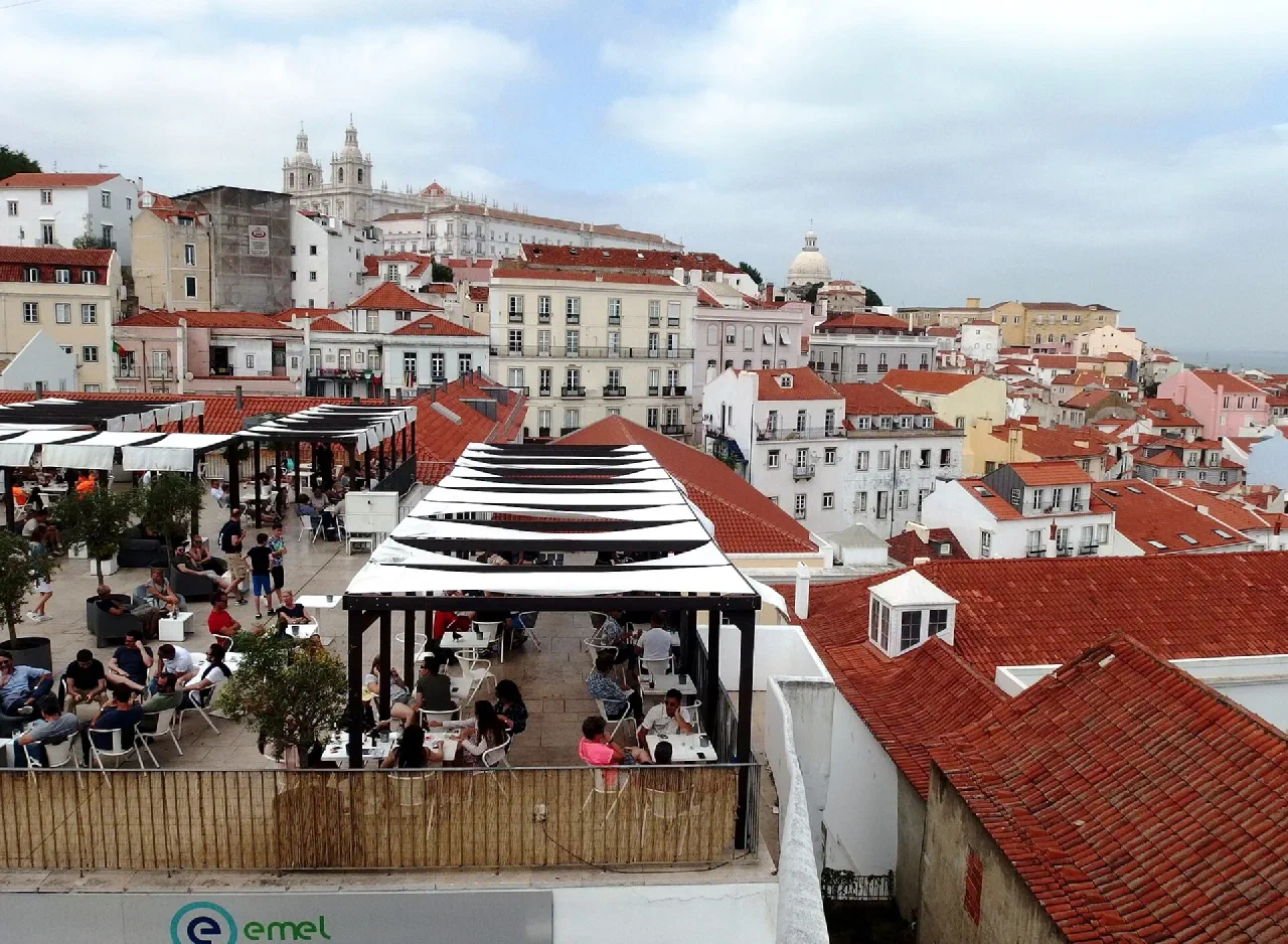 Alfama’s rooftops seen from the Portas do Sol viewpoint.