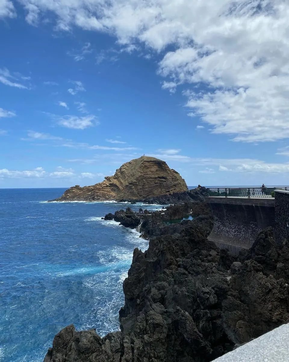 Lava rocks, Atlantic waves and the offshore islet at Porto Moniz.