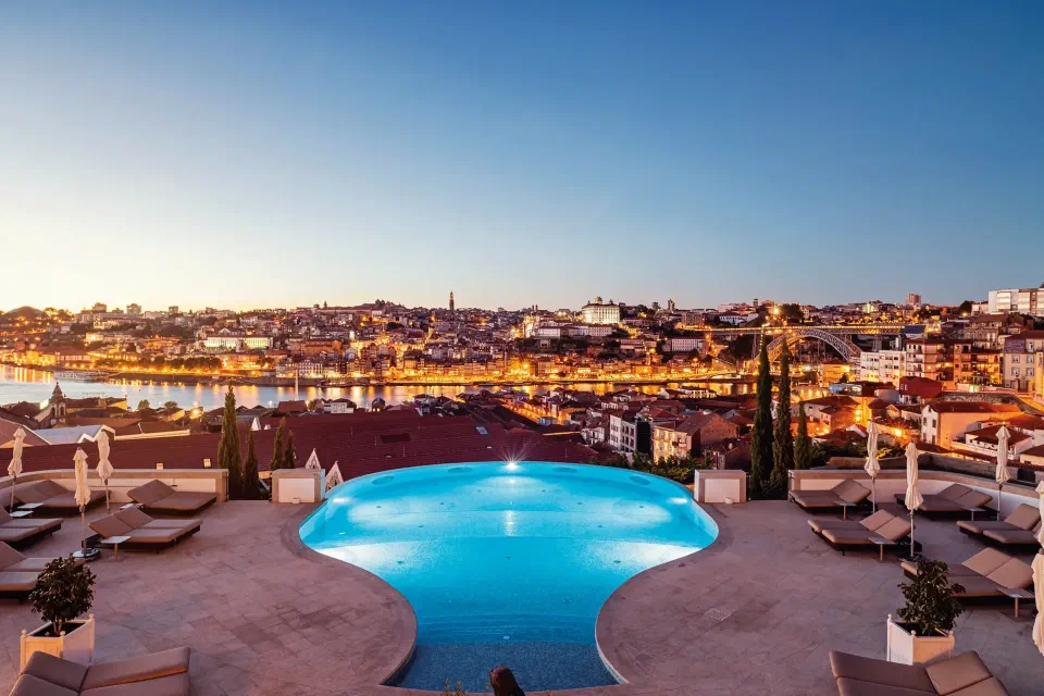 The Yeatman’s curved outdoor pool and terrace overlooking the Douro and Porto.
