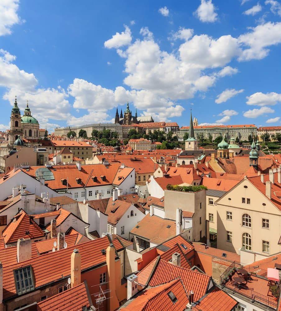 Red roofs in Malá Strana below Prague Castle and St Vitus Cathedral.