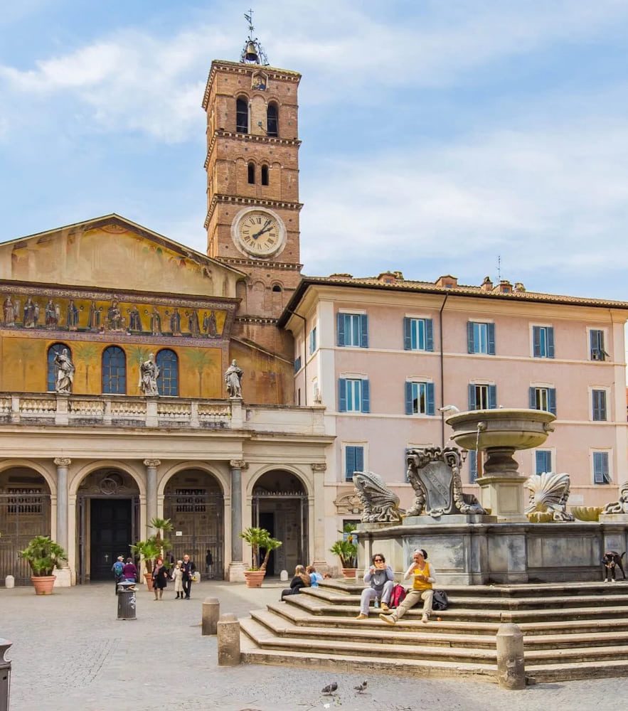 The church and fountain in Piazza Santa Maria in Trastevere.