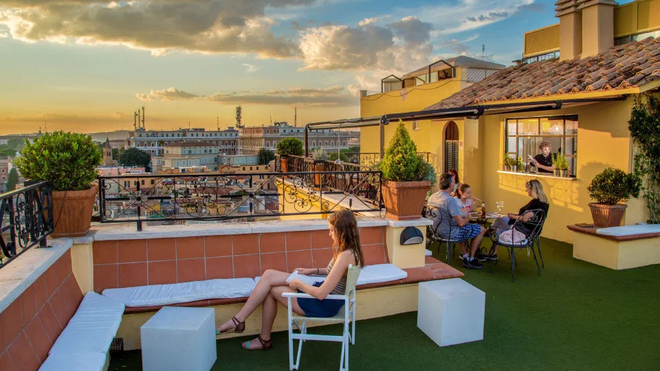 Sunset seating at the shared rooftop bar of Hotel Colosseum.