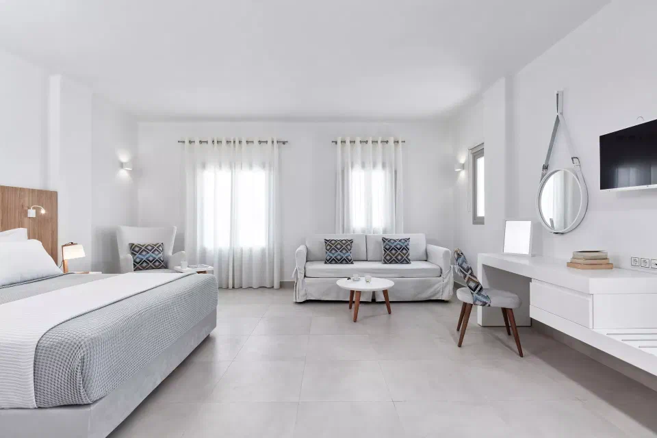 Open-plan bed and sitting area shown for the Standard Studio at Costa Grand Resort & Spa.