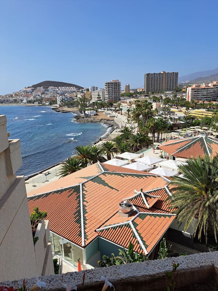 Los Cristianos beach and promenade with Montaña Chayofita behind.