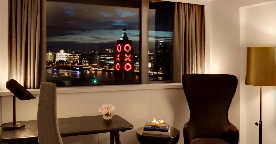 Night view across the Thames from a Superior room at Sea Containers London
